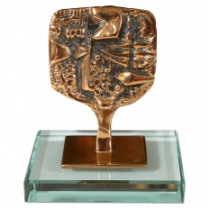 Petite brass sculpture with glass base